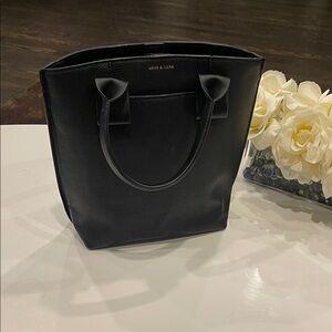 Love & Lore Black Crossbody Bag. Never used. In excellent condition